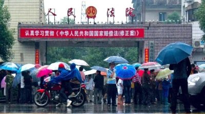 ​押钞员”朱军：不满判决，手持枪冲进法院，致三死三伤
